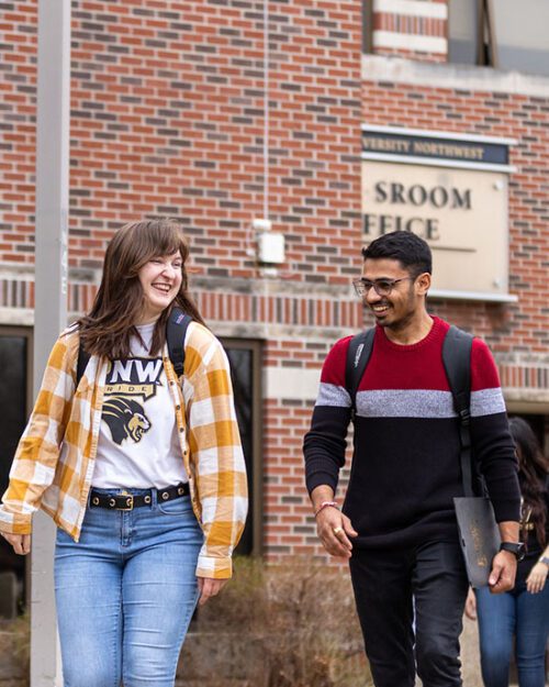 Students walk across campus at Purdue University Northwest