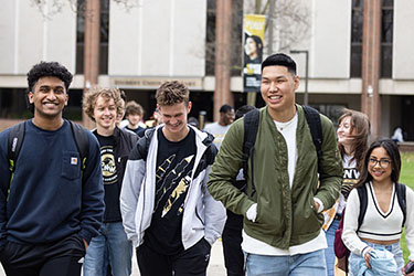 PNW students walk across campus