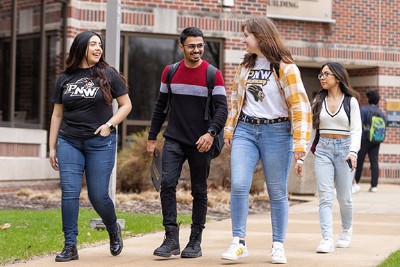 PNW students walk across campus