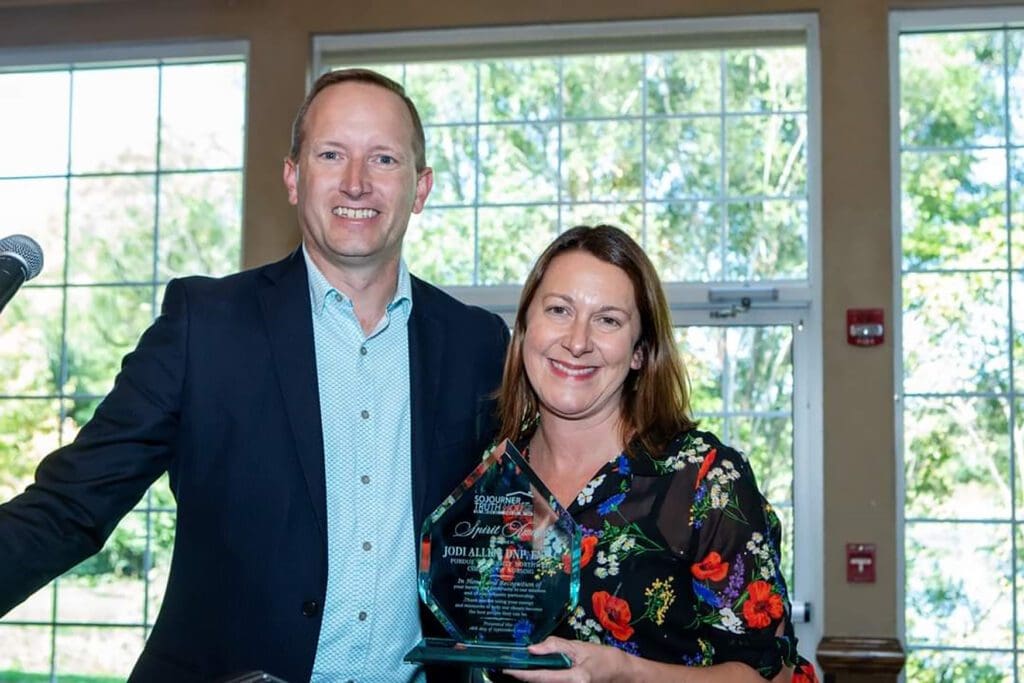 Jodi Allen, FNP program coordinator and assistant professor in the College of Nursing at Purdue University Northwest, received the Sojourner Truth House Spirit Award during the organization’s 25th Anniversary Celebration. She is pictured with previous Spirit Award recipient, Greg Lee, pastor of Suncrest Church and member of the STH board of directors. 