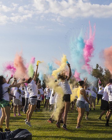 Students throw color to kick off the PNW Pride Stride 5k