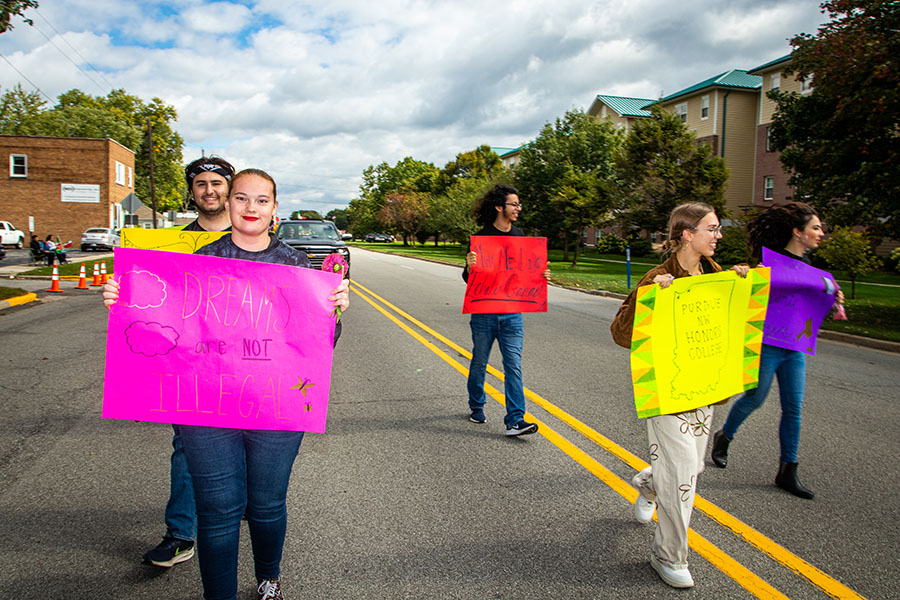 Honors College students walk in the Hispanic Heritage parade