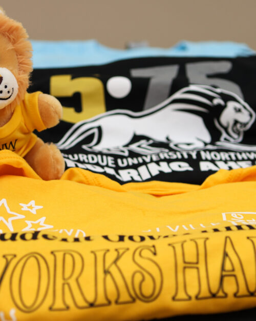 Some of the contributed items to the time capsule included a plush lion from Student Government Association and various PNW-themed t-shirts.
