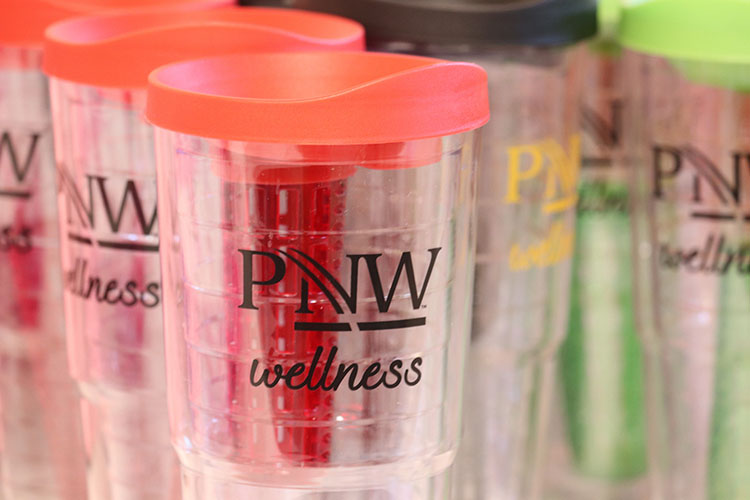 A row of PNW Wellness cups at the Center for Healthy Living