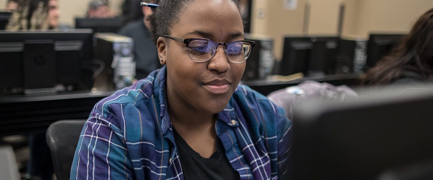 Student works at a computer