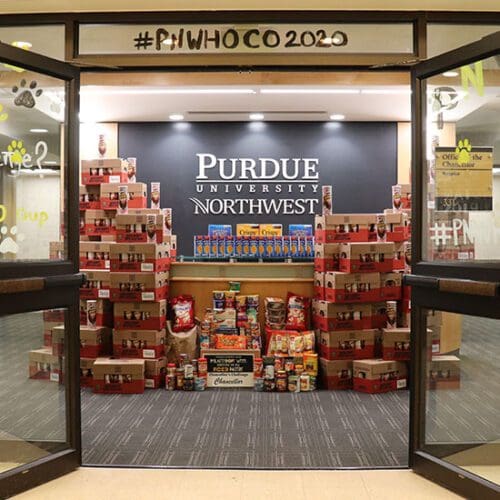 Stacks of food surround the Chancellor's reception desk