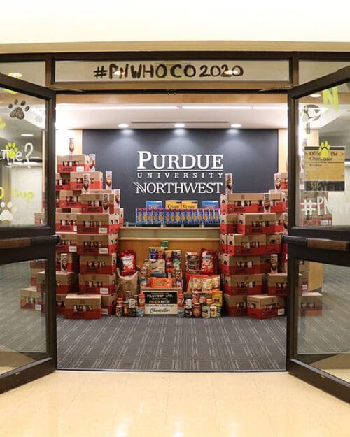 Stacks of food surround the Chancellor's reception desk