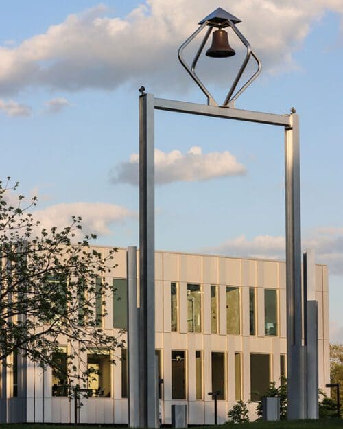 The PNW Bell Tower with the Student Union Library Building in the background