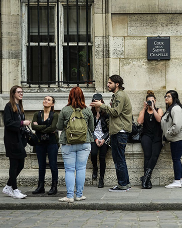 PNW students stand outdoors on a study abroad program in France.