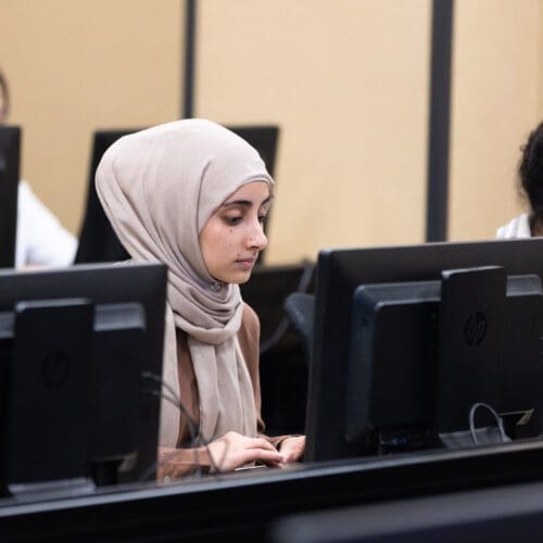 Students at desk in classrom