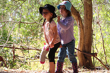 Kids play outside at Gabis Arboretum