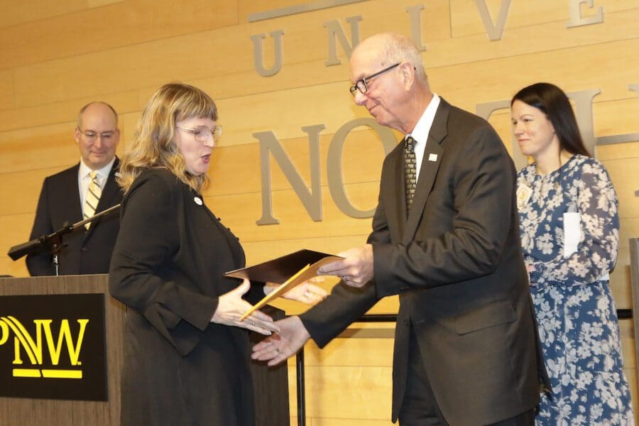 Tom Keon hands out awards in celebration of Founders Day.