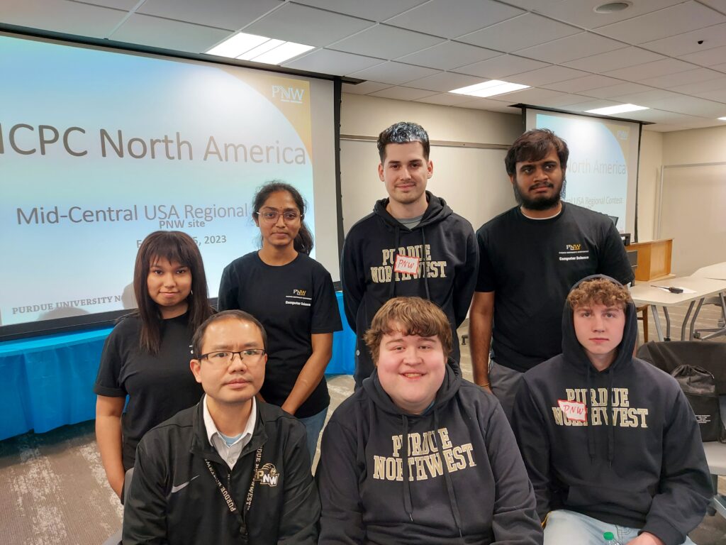 Several PNW representatives competed in the ICPC contest as well as volunteered during the event. Participants included (front, from left to right), Wei Dai, assistant professor of Computer Science; Bruno Hnatusko, Computer Science graduate student; Andrew McDowell, second-year Electrical Computer Engineering major; (back, from left to right) Diya Kafle, third-year Computer Science major; Sai Deepthi Jammula, Computer Science graduate student; Diego Ramirez, fourth-year Computer Science major; and Gowtham Pentela, Computer Science graduate student. Not pictured is Alejandro Alvarez, third-year Computer Science major.