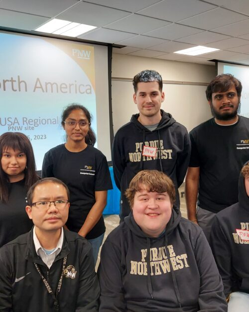 Several PNW representatives competed in the ICPC contest as well as volunteered during the event. Participants included (front, from left to right), Wei Dai, assistant professor of Computer Science; Bruno Hnatusko, Computer Science graduate student; Andrew McDowell, second-year Electrical Computer Engineering major; (back, from left to right) Diya Kafle, third-year Computer Science major; Sai Deepthi Jammula, Computer Science graduate student; Diego Ramirez, fourth-year Computer Science major; and Gowtham Pentela, Computer Science graduate student. Not pictured is Alejandro Alvarez, third-year Computer Science major.