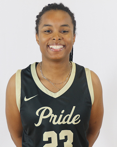 Kennedy Jackson poses in a PNW Pride women's basketball jersey