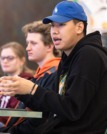 A student talks during a class