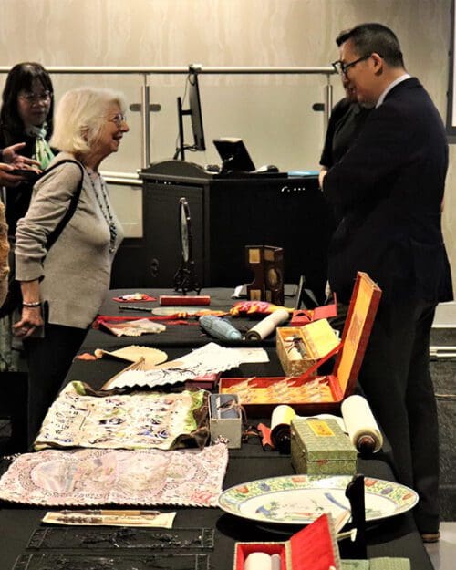 Tao Wang, Pritzker Chair of Arts of Asia, executive director of initiatives in Asia, and curator of Chinese art at the Art Institute of Chicago, right, shares information about PNW’s archive items from China.