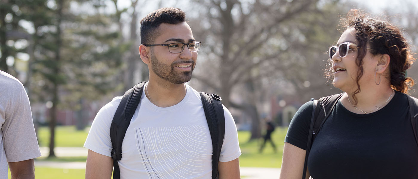 Students walk together across campus