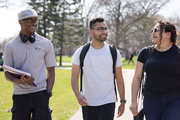 Students walk together across campus