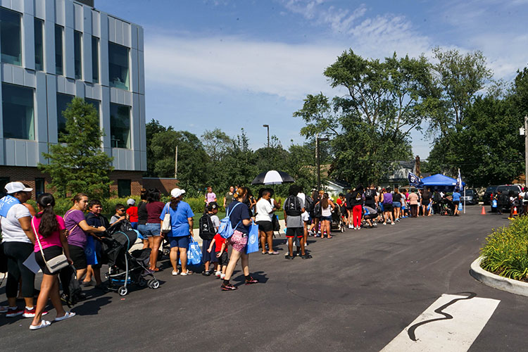 People lined up to get school supplies at Purdue University Northwest