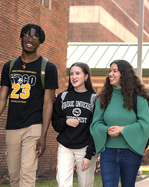 PNW students walk across campus together