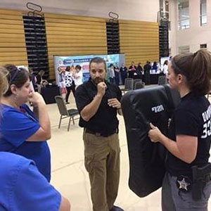 Hammond Police Officer Daniel Mohoi demonstrates self-defense training