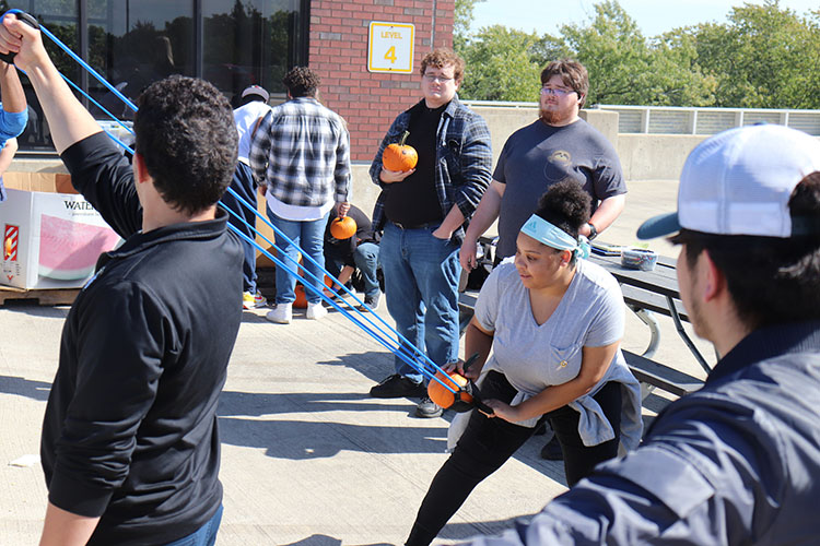 PNW student launch pumpkins off the Hammond Campus parking garage.