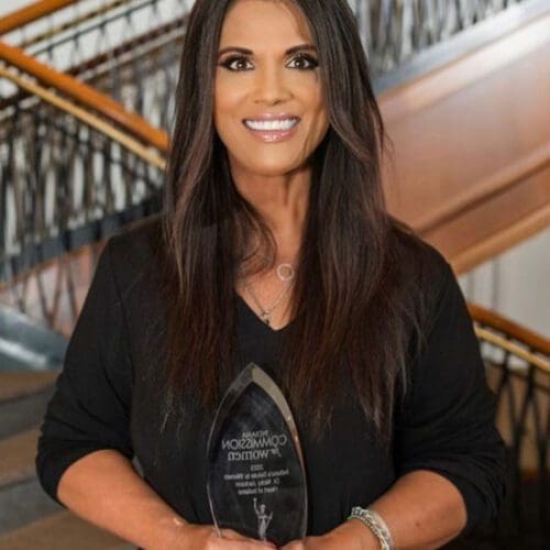 Nicky Jackson poses with her Heart of Indiana award.