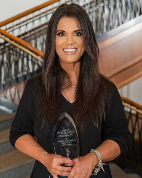 Nicky Jackson poses with her Heart of Indiana award.