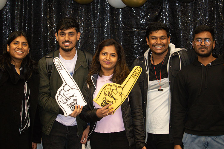 A group of five PNW students pose for image in celebration of first-generation student scholars.