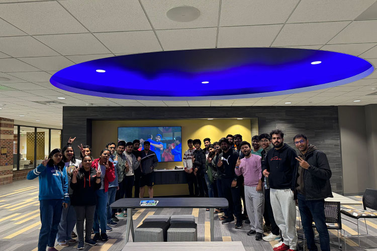 Group of students gathered to watch the ICC Men's Cricket World Cup in the Mane Zone.