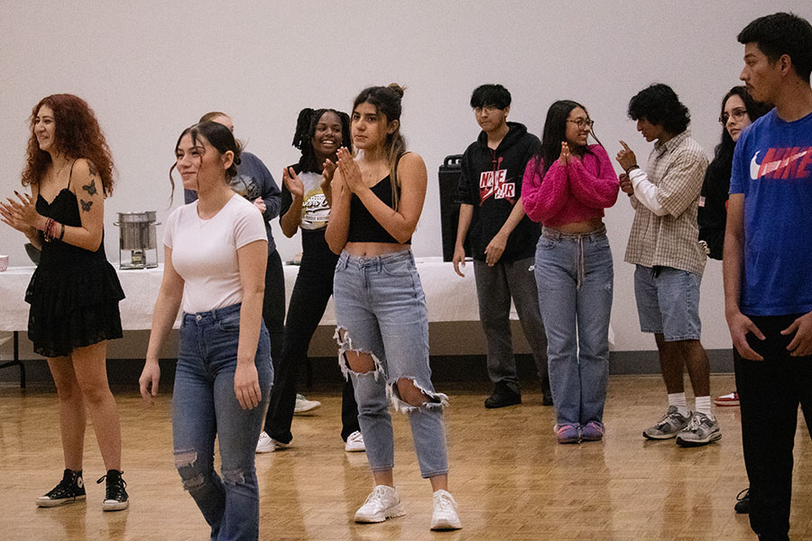 Students in Alumni Hall during a dance lesson