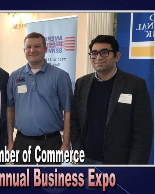 Professor Ashok Raja stands next to another panel member. Raja is on the right.