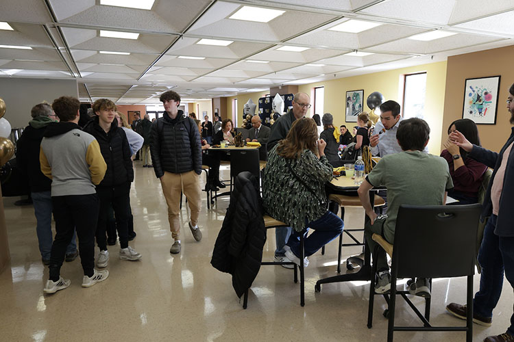 PNW students, faculty and staff partake in food and entertainment in the Gallery Café during the Excellence Evolving leadership celebration at PNW’s Westville campus.