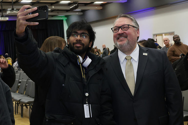 Selfies and smiles abound during PNW’s Excellence Evolving leadership celebration for Chancellor Chris Holford.