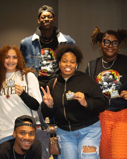 Five students pose together during the Black History Month Launch Party