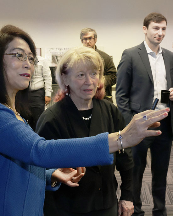 Chenn Zhou, NIPSCO Distinguished Professor of Engineering Simulation and founding director of CIVS, demonstrates simulation technology to Geri Richmond, U.S. Department of Energy Under Secretary for Science and Innovation.