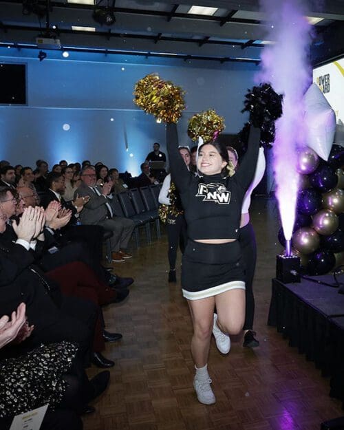 PNW cheerleaders march in at Founders Day 2024