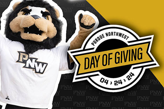 PNW mascot Leo raises his arm next to a logo reading, "Purdue Northwest Day of Giving, 4/24/24"