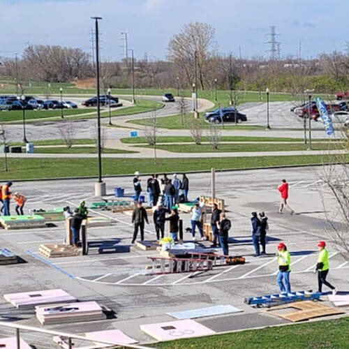 Student teams prepare for a concrete canoe event at Wolf Lake Memorial Park.