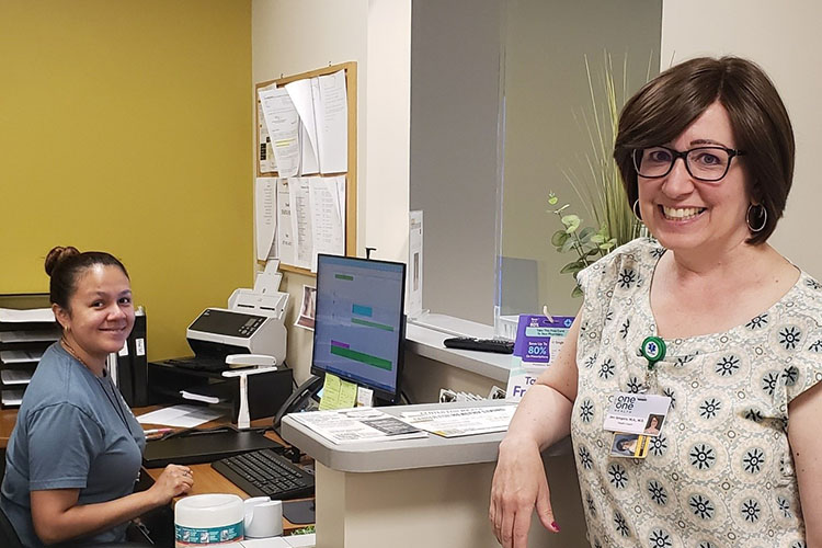 Two of the Center for Healthy Living staff at front desk