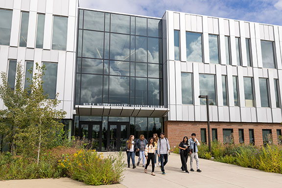 Students walk out of the Nils K Nelson Bioscience Innovation Building