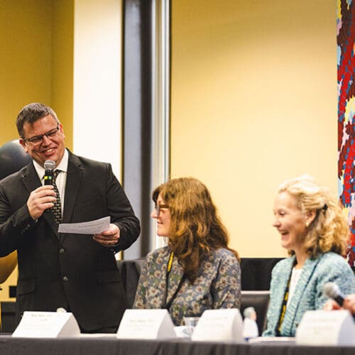 Faculty members sit on a panel