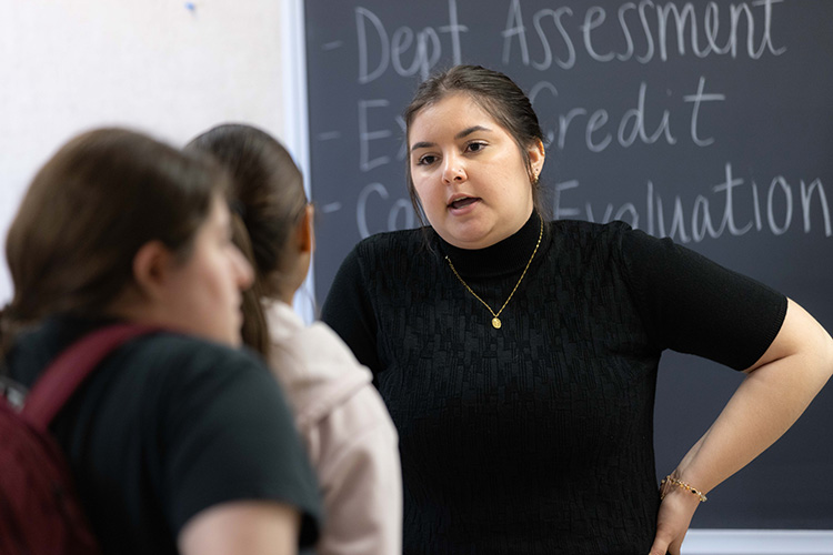 Two students talking to each other
