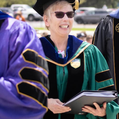 PNW faculty members process into Commencement
