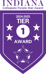 Logo: Indiana Collegiate Purple Star Award. 2024-2025 Tier 1 Award.Text is over a purple banner decorated with stars