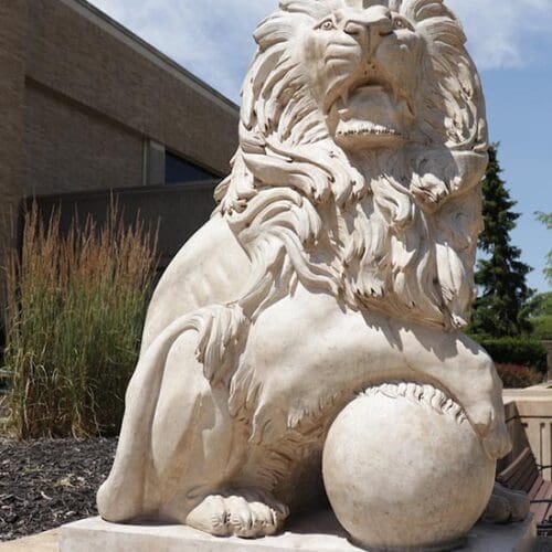 Close up of a lion sculpture outside a building at Purdue University Northwest