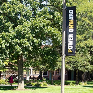 A Power Onward banner on the quad at Purdue University Northwest