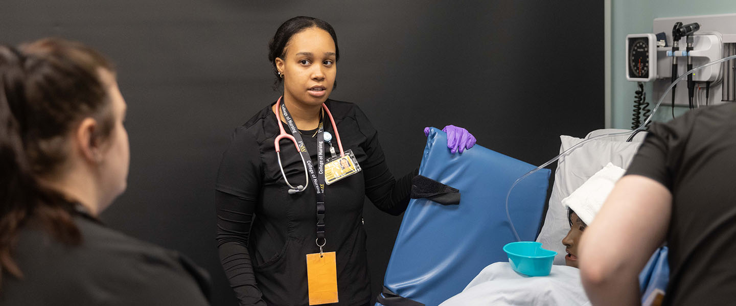 A student in a nursing lab