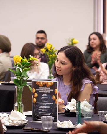 PNW students sit at a luncheon